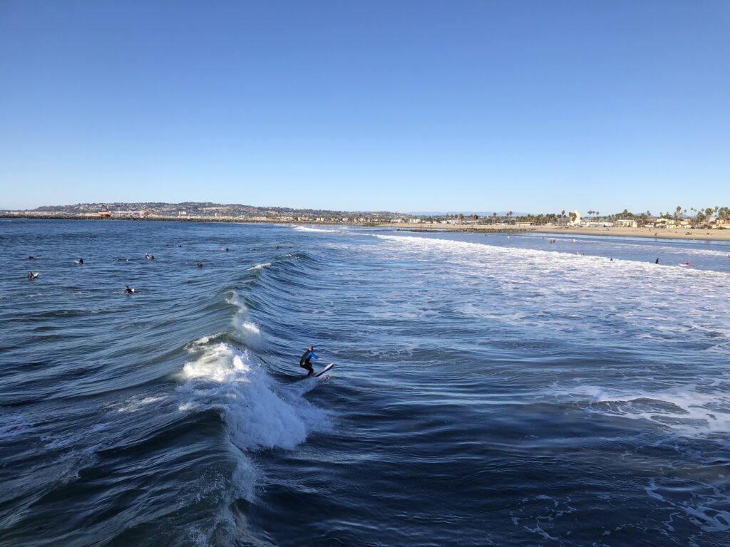 surfing ocean beach pier